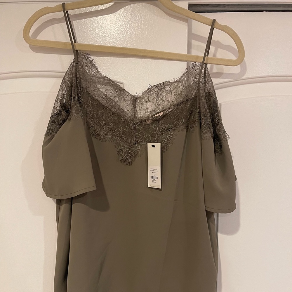 Francesca’s cold shoulder lace top.